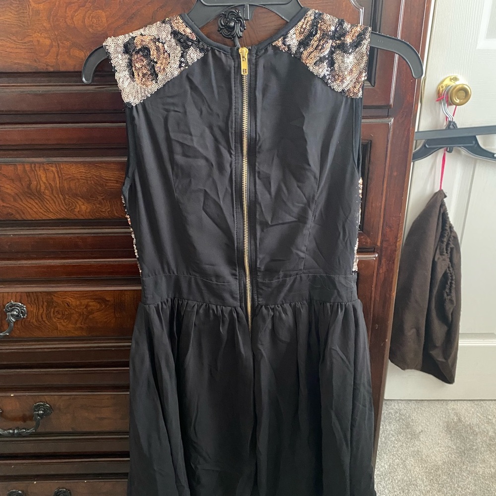 Sequin black and gold dress just in time for the holidays!
